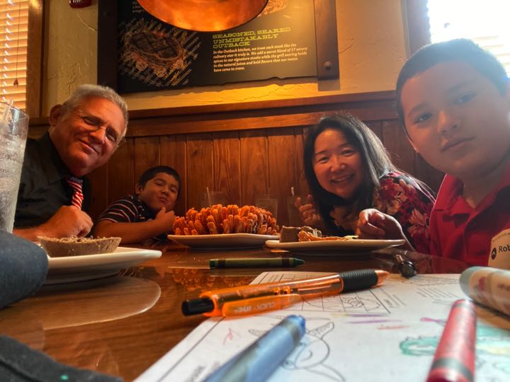 Vail family sharing an appetizer