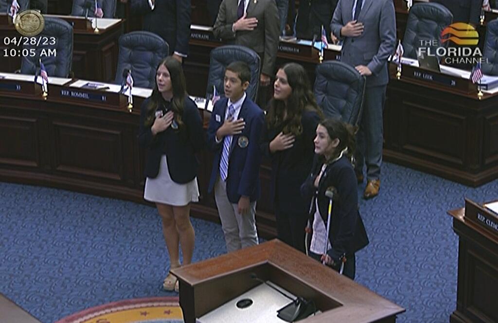 Ben Vail leads the Pledge of Allegiance on the floor of the Florida State House of Representatives April 2023