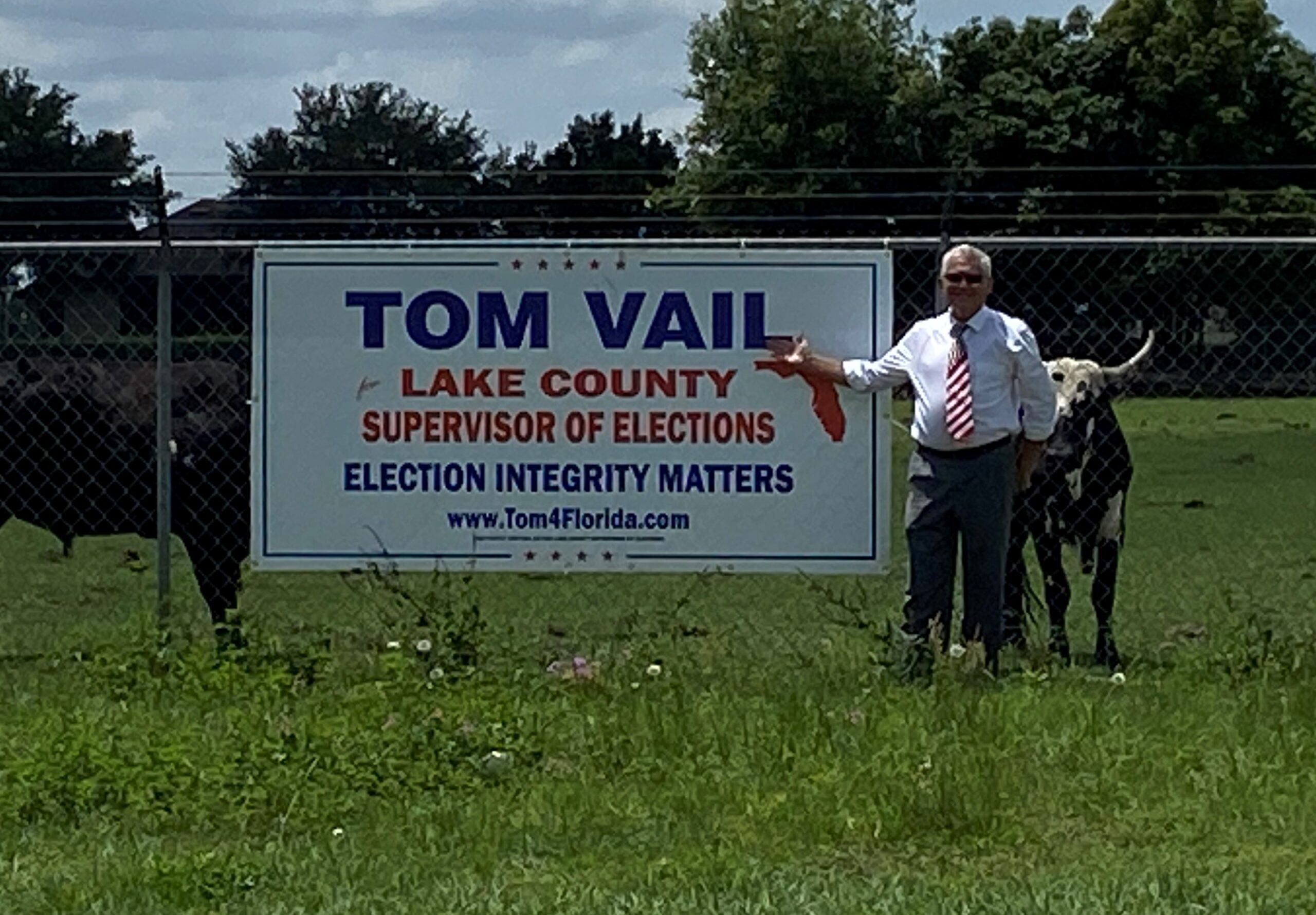 Tom Vail with campaign sign, May 2023