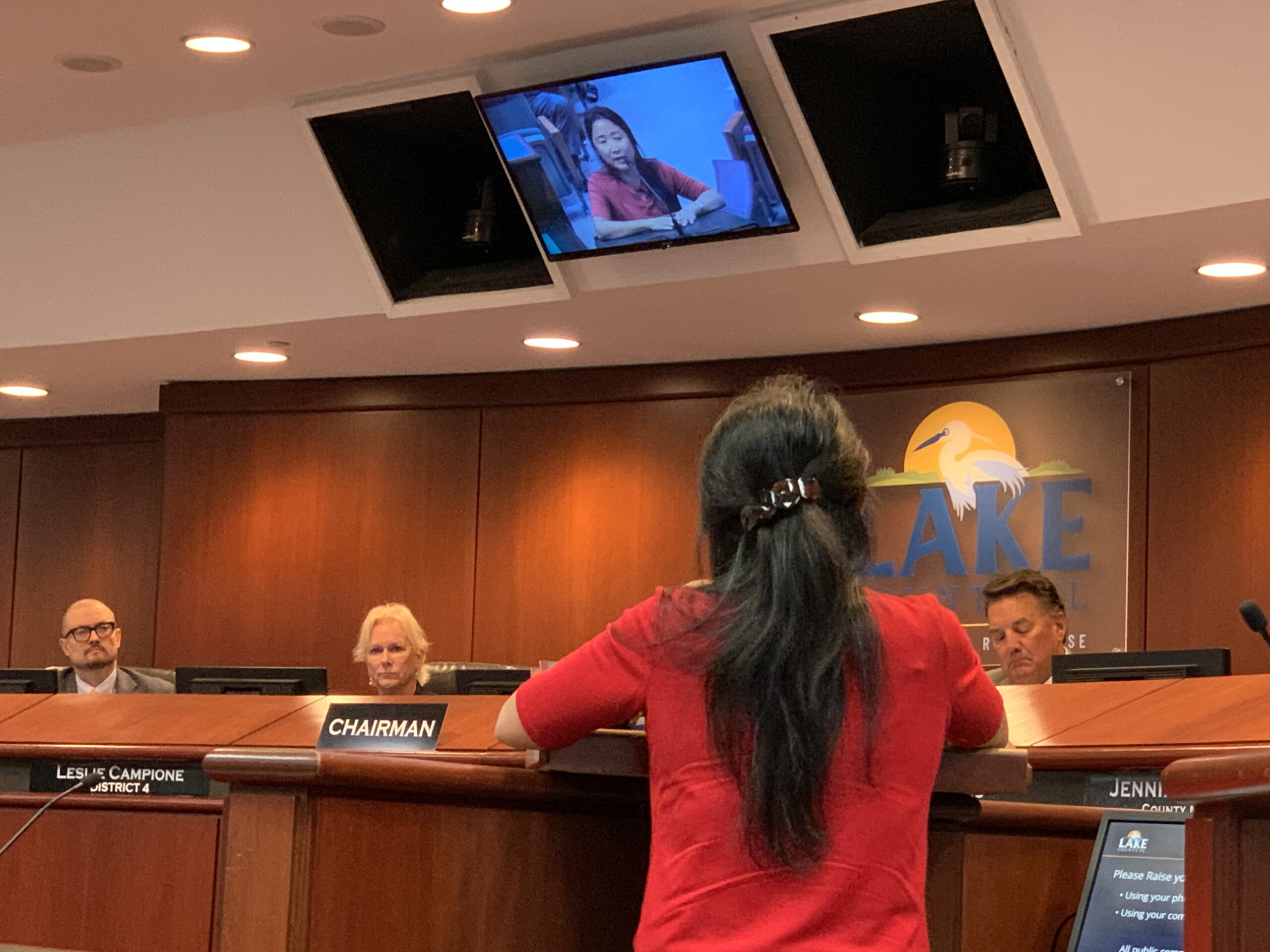 Vara Vail speaking with Lake County Commissioners about Elections